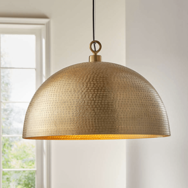 gold dome pendant light with hammered brass surface